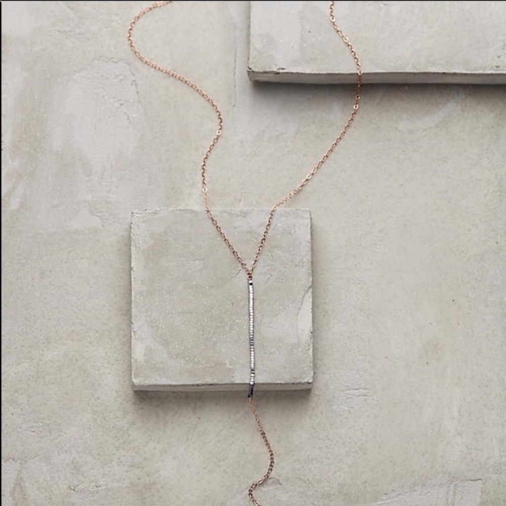 Anthropologie rose gold and black lariat necklace